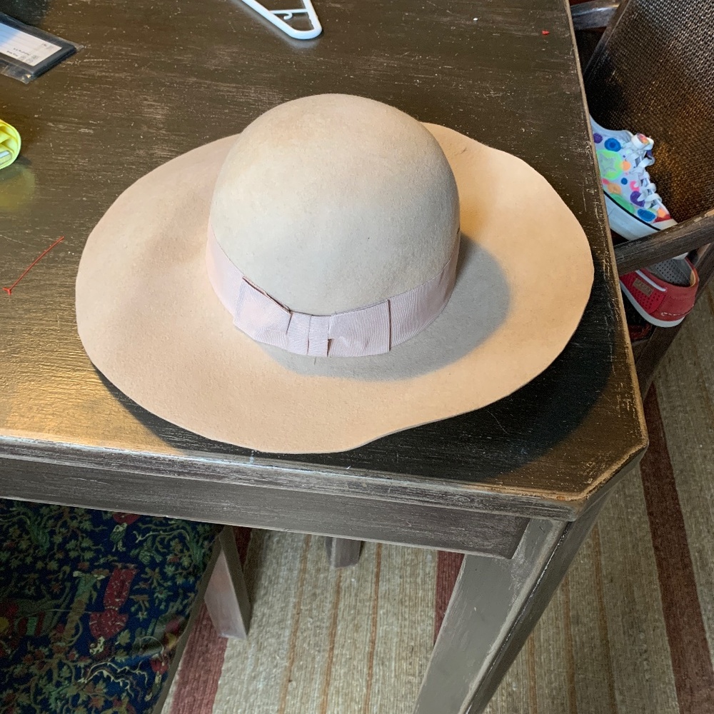White House Black Market Ny Trl floppy hat in caramel color. 100 % wool . 64.00